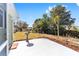 Concrete patio with bird bath and landscaping at 11436 Sw 84Th Court Rd, Ocala, FL 34481