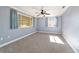 Spacious bedroom with light walls and carpet flooring at 11436 Sw 84Th Court Rd, Ocala, FL 34481