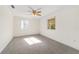 Spacious bedroom with plush carpeting and lots of natural light at 11436 Sw 84Th Court Rd, Ocala, FL 34481