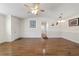 Spacious living room featuring hardwood floors, and a dining area at 11436 Sw 84Th Court Rd, Ocala, FL 34481