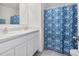 Bathroom with double vanity and a shower at 141 Hickory Course Cir, Ocala, FL 34472