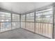 Spacious screened balcony overlooking wooded area at 7874 Midway Drive Ter # V201, Ocala, FL 34472