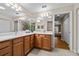 Double vanity bathroom with a view of the bedroom at 8036 Sw 78Th Terrace Rd, Ocala, FL 34476