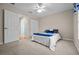 Cozy bedroom with a full bed and en-suite bathroom at 8036 Sw 78Th Terrace Rd, Ocala, FL 34476