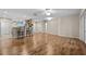 Hardwood floor living room with a view of the kitchen at 8036 Sw 78Th Terrace Rd, Ocala, FL 34476