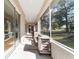 The patio features great views of the backyard and is perfect for relaxing outdoors at 11031 Sw 69Th Cir, Ocala, FL 34476