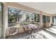 Enjoy the outdoors on this screened patio with views of the large backyard at 11031 Sw 69Th Cir, Ocala, FL 34476