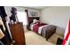 Bedroom with double bed, dresser, and gaming setup at 1326 Spring Lite Way, Orlando, FL 32825