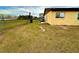 Backyard with partial fence and view of field at 1328 Spring Lite Way, Orlando, FL 32825