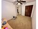 Bedroom with carpet, ceiling fan and closet at 1328 Spring Lite Way, Orlando, FL 32825