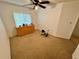 Bedroom with carpeted floor and ceiling fan at 1328 Spring Lite Way, Orlando, FL 32825