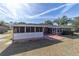 House with screened porch and large backyard at 3261 Se 32Nd St, Ocala, FL 34471