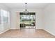 Dining room with tile flooring and sliding glass doors to patio at 9664 Sw 76Th Lane Rd, Ocala, FL 34481