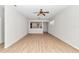 Open living room with vinyl plank flooring and kitchen view at 9664 Sw 76Th Lane Rd, Ocala, FL 34481