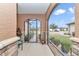 Spacious screened porch with wrought-iron gate and plenty of room for outdoor furniture at 9664 Sw 76Th Lane Rd, Ocala, FL 34481