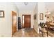 Tiled foyer showcasing front door, leading to a dining area at 2922 Se 38Th Pl, Ocala, FL 34480