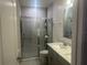 Bathroom with shower and single vanity at 45 Orchid Ct, Kissimmee, FL 34759