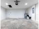 Clean, well-lit garage with a concrete floor and new water heater at 11 Locust Terrace Way, Ocala, FL 34472