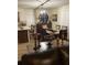 Inviting dining area featuring a dark wood table and an open floor plan into the kitchen at 2060 Se 39Th St, Ocala, FL 34480