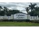 The Calumet Grove community sign surrounded by manicured landscaping gives an inviting welcome at 16862 Se 80 Bellavista Cir, The Villages, FL 32162