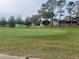 Expansive view of the lush golf course, offering beautiful green spaces and recreational opportunities at 16862 Se 80 Bellavista Cir, The Villages, FL 32162