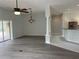 Large living room with tile, open concept to kitchen and dining space at 16862 Se 80 Bellavista Cir, The Villages, FL 32162