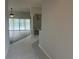 Open-concept living space with pool view from entryway at 16862 Se 80 Bellavista Cir, The Villages, FL 32162