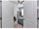 Bright bedroom with a light blue color scheme and a ceiling fan at 5341 Nw 48Th Pl, Ocala, FL 34482