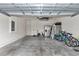 Spacious garage with plenty of room for storage and vehicles, including bikes and scooters at 5341 Nw 48Th Pl, Ocala, FL 34482