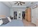 View of the main bedroom with an ensuite bathroom, walk-in closet and a private wardrobe at 5341 Nw 48Th Pl, Ocala, FL 34482