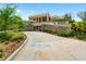 Community amenity center with beautiful stone facade, offering accessible parking and lush landscaping at 9481 Sw 93Rd Loop, Ocala, FL 34481