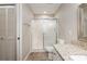 Bathroom featuring a tiled floor, glass shower, and single vanity at 9481 Sw 93Rd Loop, Ocala, FL 34481