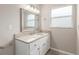 Well-lit bathroom with granite countertops and modern lighting at 9481 Sw 93Rd Loop, Ocala, FL 34481