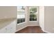 Dining area features bright windows, laminate floors, and a closet at 9481 Sw 93Rd Loop, Ocala, FL 34481