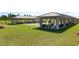 Community shuffleboard courts in a well-maintained green space at 9481 Sw 93Rd Loop, Ocala, FL 34481