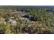 Beautiful home surrounded by lush greenery and trees at 12880 Sw 66Th St, Ocala, FL 34481