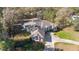 Charming single-story home on a large lot with screened in patio and well-maintained landscaping at 12880 Sw 66Th St, Ocala, FL 34481