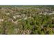 High angle aerial shot of the house surrounded by trees and forest at 12880 Sw 66Th St, Ocala, FL 34481