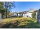 Backyard view featuring a lush lawn and privacy fence at 12880 Sw 66Th St, Ocala, FL 34481