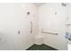 Shower includes marble-tiled walls, green tile floors, grab bars, and a built-in corner seat at 12880 Sw 66Th St, Ocala, FL 34481