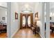 Elegant entryway with double doors, chandelier, and decorative tile flooring at 12880 Sw 66Th St, Ocala, FL 34481