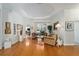 Spacious living room with hardwood floors, tray ceilings, and ample natural light at 12880 Sw 66Th St, Ocala, FL 34481