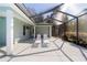Backyard featuring a screen enclosed pool and patio, perfect for relaxing outdoors at 12880 Sw 66Th St, Ocala, FL 34481