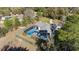 Aerial view of a fenced pool and landscaped backyard of this beautiful home at 12880 Sw 66Th St, Ocala, FL 34481