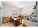 Sewing room filled with tables, sewing machines, and crafting supplies at 12880 Sw 66Th St, Ocala, FL 34481