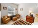 Sitting area inside main bedroom with comfortable seating and natural light at 12880 Sw 66Th St, Ocala, FL 34481