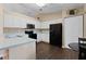 Functional kitchen with white cabinets, black appliances, and ample counter space at 1762 Ne 39Th St, Ocala, FL 34479