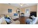Relaxing living room with a large sectional couch and wood floors at 1762 Ne 39Th St, Ocala, FL 34479