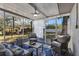 Enjoy the outdoor space on this screened-in patio with comfortable seating at 1762 Ne 39Th St, Ocala, FL 34479