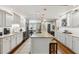 Beautiful kitchen with granite counters, stainless appliances, and hardwood floors at 906 Crestview Dr, Auburndale, FL 33823